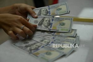 Dolar AS Naik Tipis Saat Pertemuan Fed Dimulai